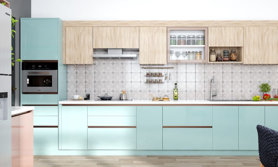 A Blue Modular Kitchen With A Tiled Backsplash