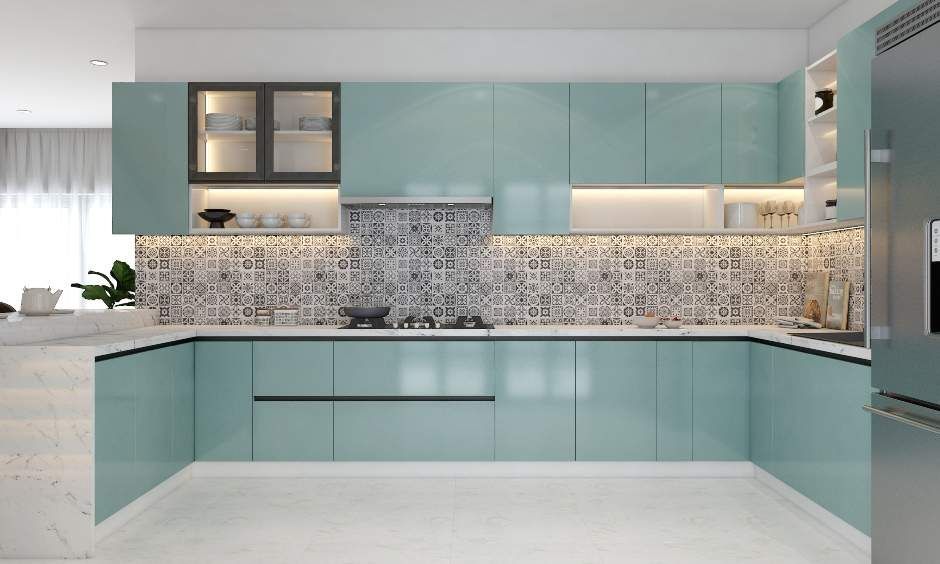 A Spacious Pastel Blue Kitchen With Breakfast Counter (3)